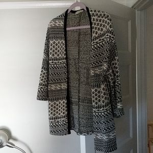 Black and cream patterned sweater